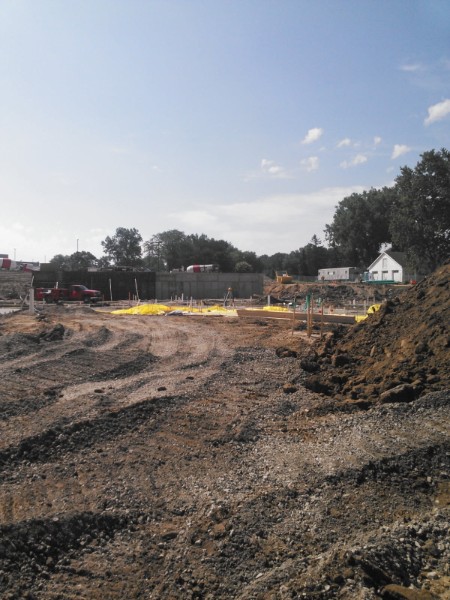 Wide view of site preparation and earthmoving work
